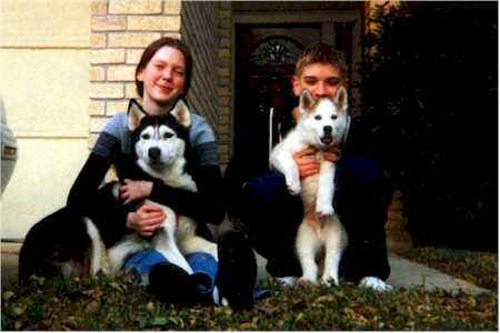 Melissa holding Natasha & Matthew holding puppy Nikolai at Christmas in San Antonio 1998