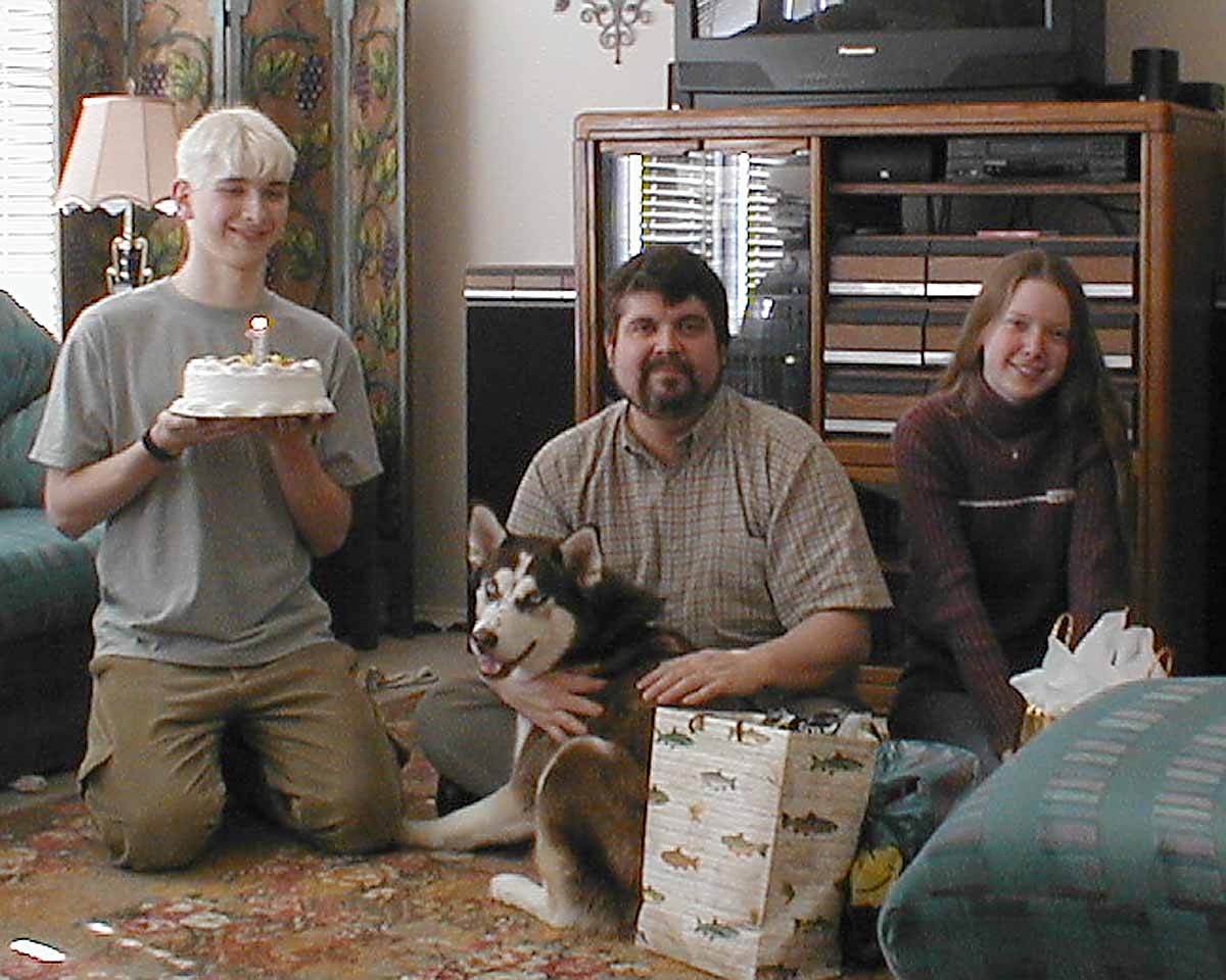 From left to right: Matthew (with cake), Sasha, Uncle Ron & Melissa