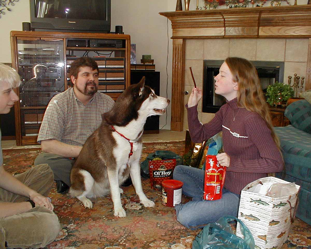 Matt, Uncle, Sasha (sampling the puppy shower gifts) & Melissa doing the feeding